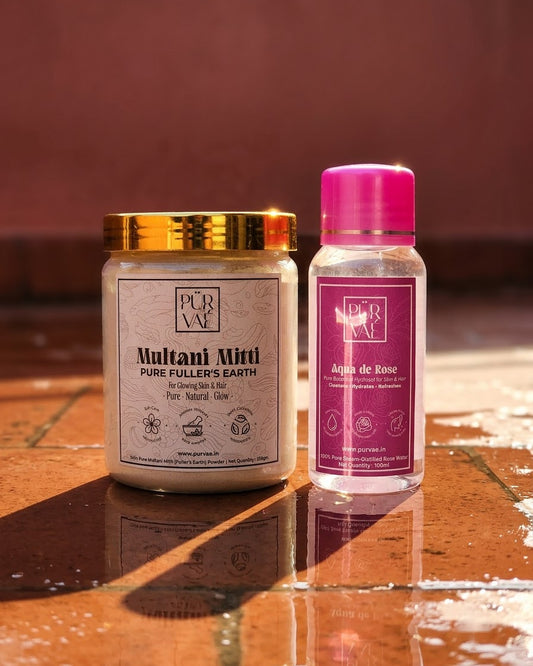 What's inside the Purvae Mitti Ritual: Multani mitti jar and rose water bottle on a tile