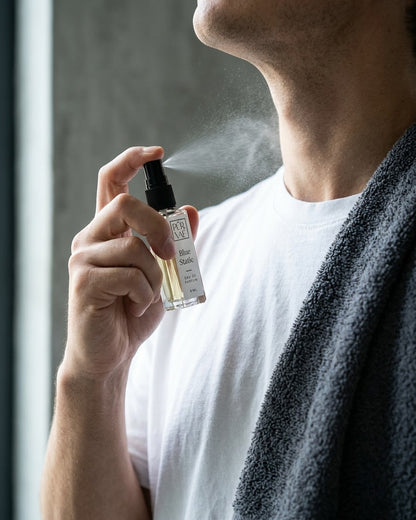 Spraying Blue Static on the neck after the gym