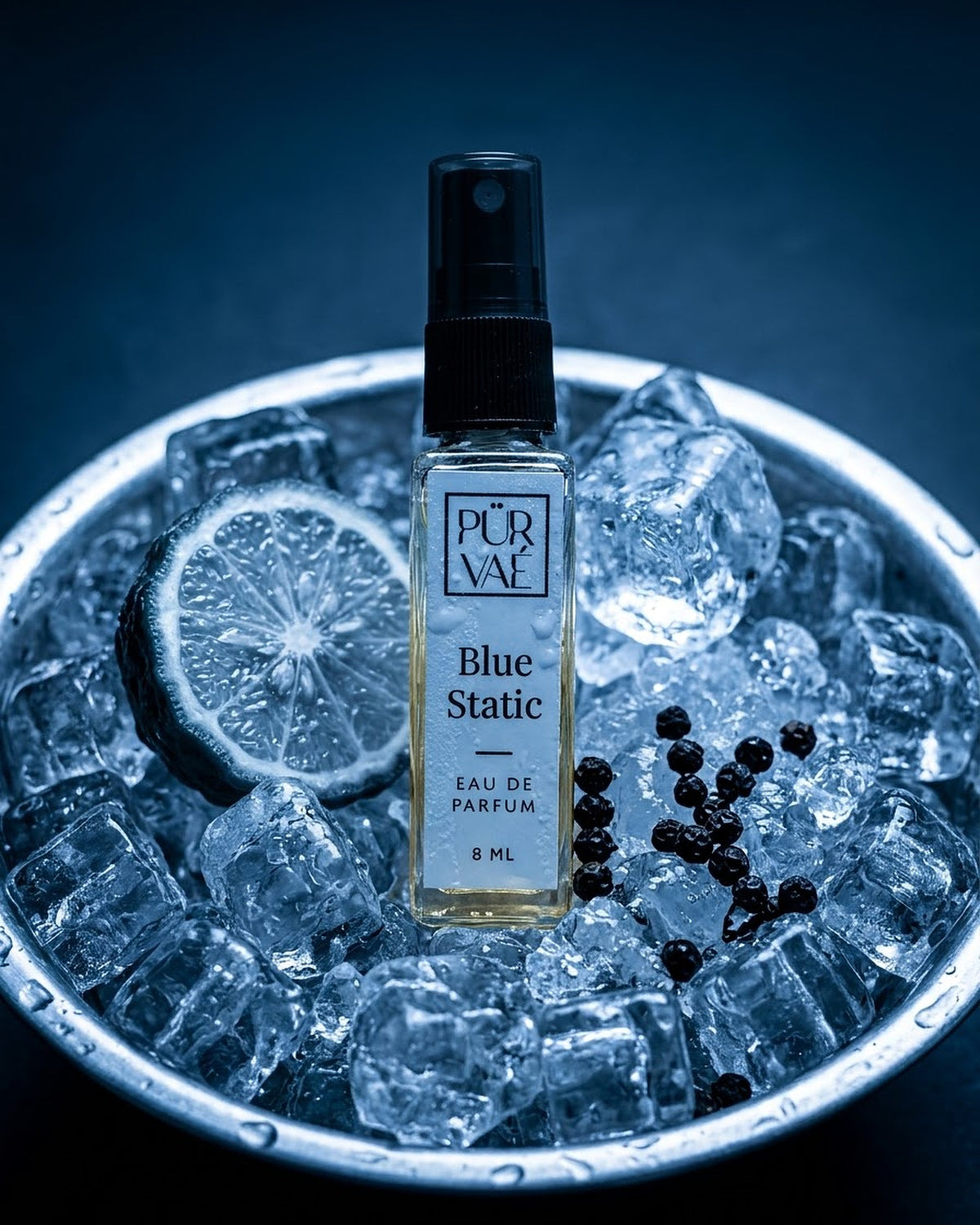 Blue Static standing in a bowl of ice with bergamot and peppercorns