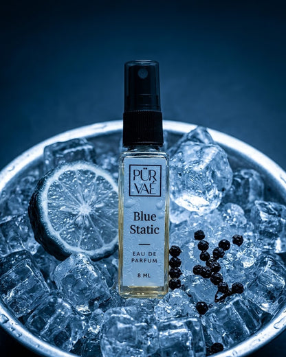 Blue Static standing in a bowl of ice with bergamot and peppercorns