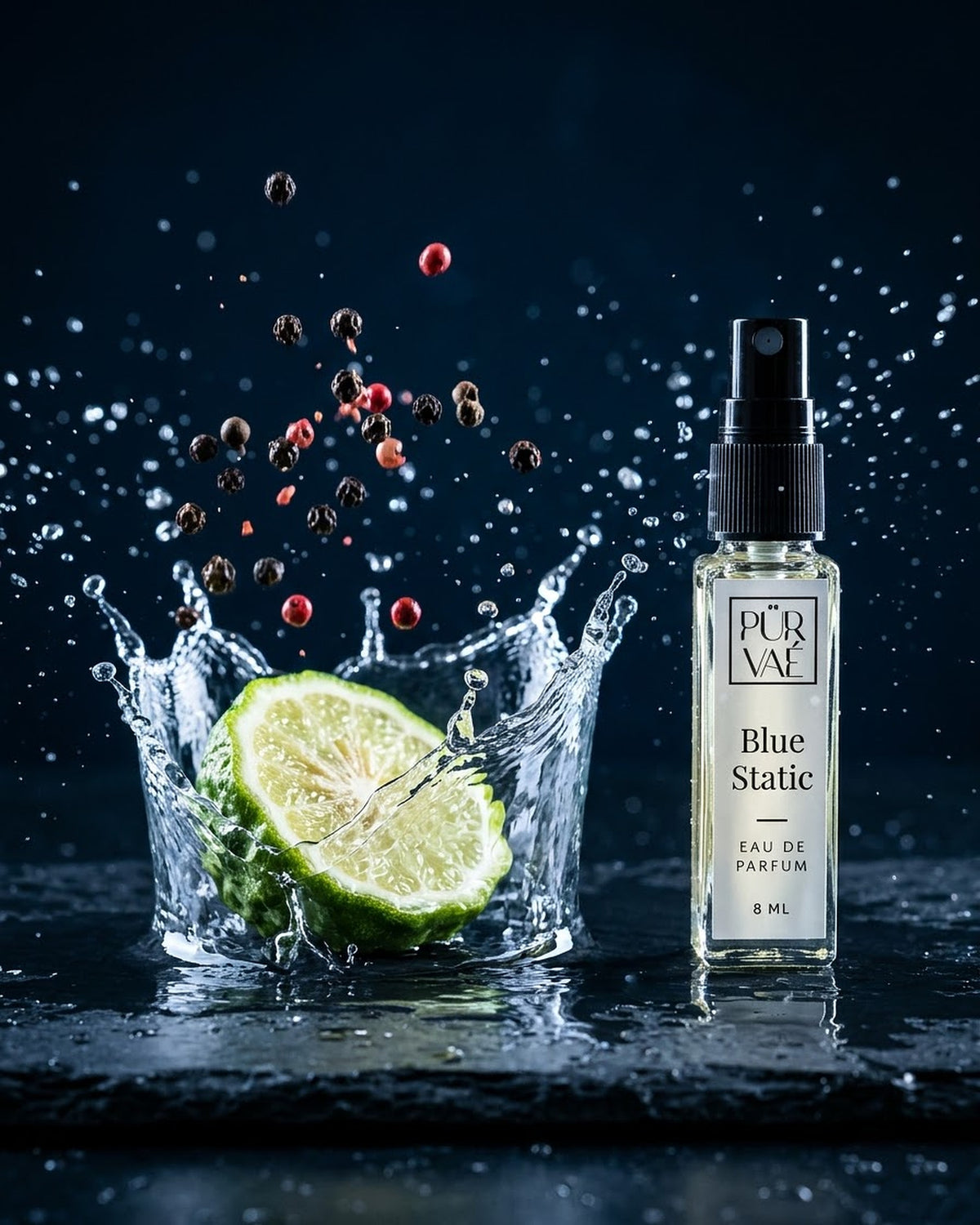 Bergamot and peppercorns splashing into water beside Blue Static