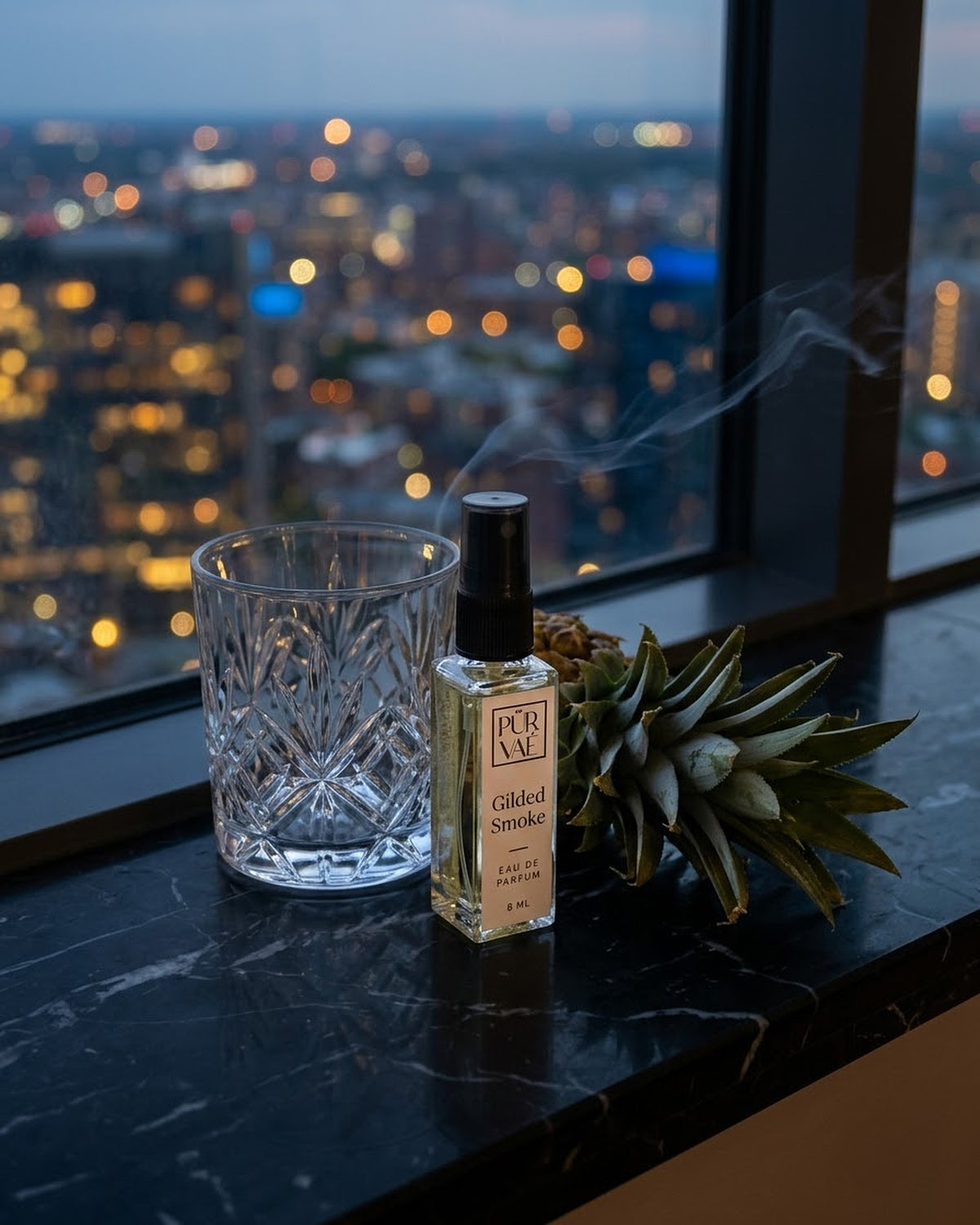 Gilded Smoke on a window ledge above the city at dusk