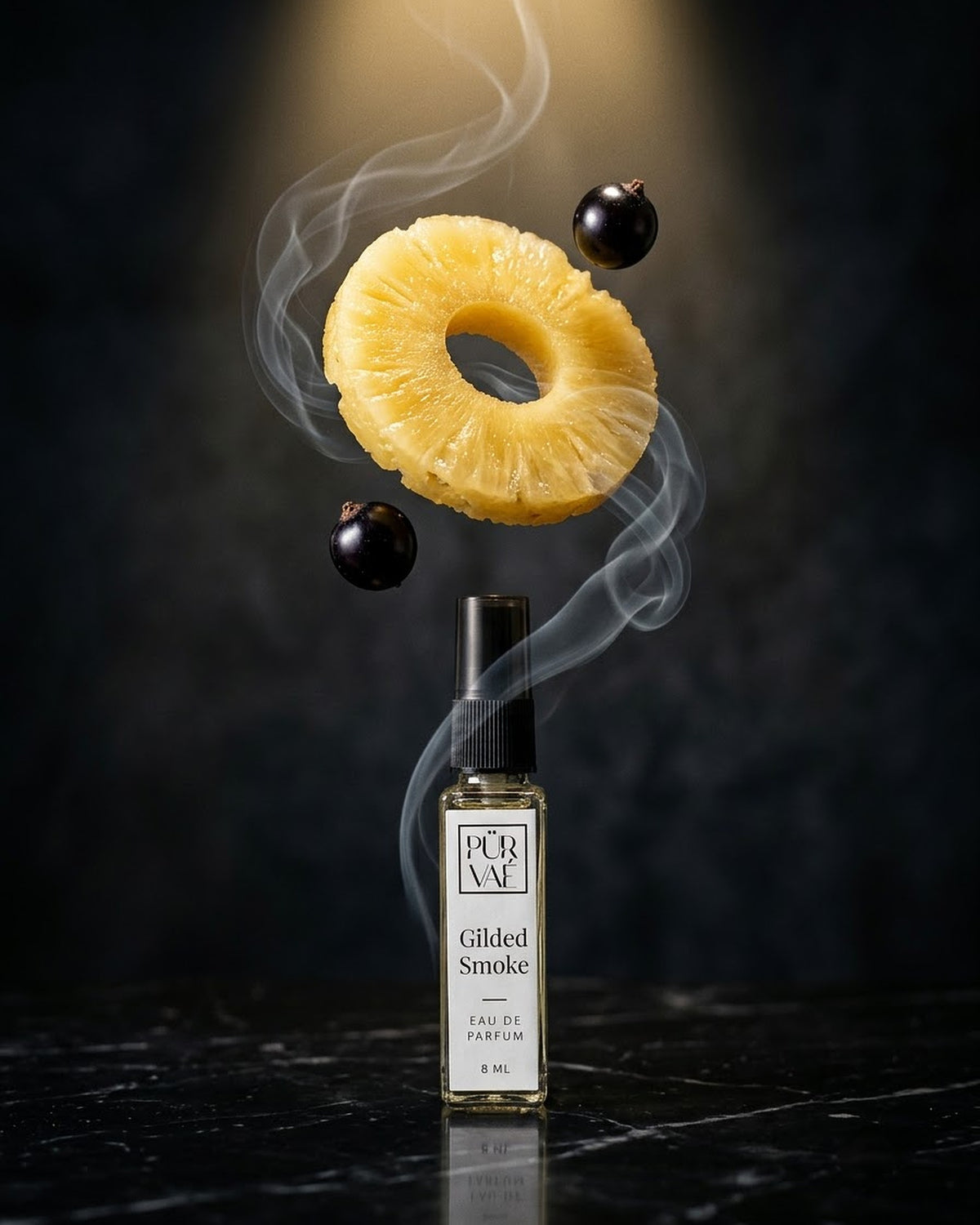 Pineapple ring, blackcurrants and birch smoke above Gilded Smoke