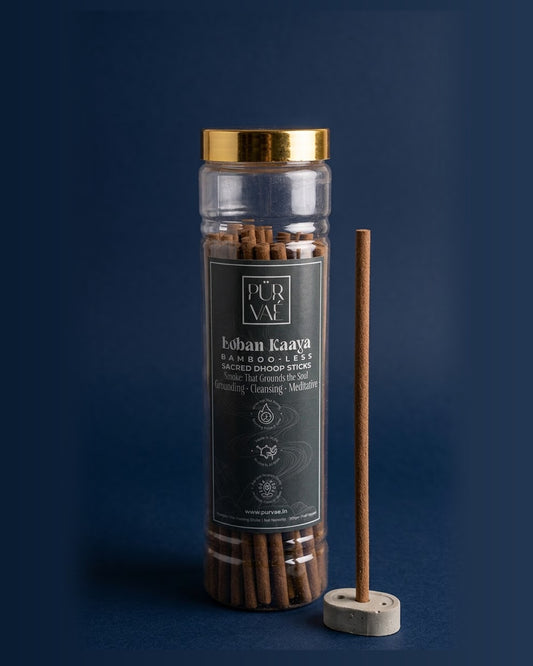 Purvae Loban Kaaya bambooless dhoop sticks in a 200 g clear jar with a stick in its cement holder
